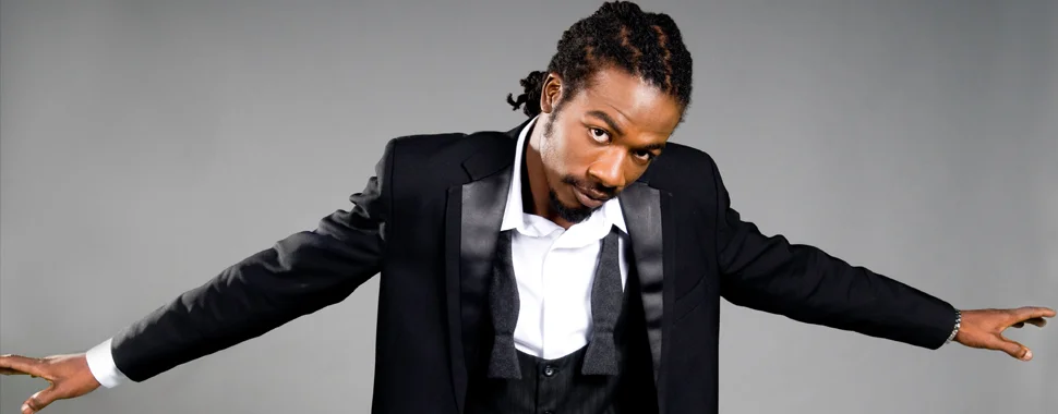 Gyptian with his arms wide open bc he's hot.jpg