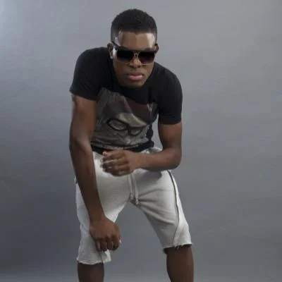 OMI looking hot in sweatpants shorts and sunglasses.jpg