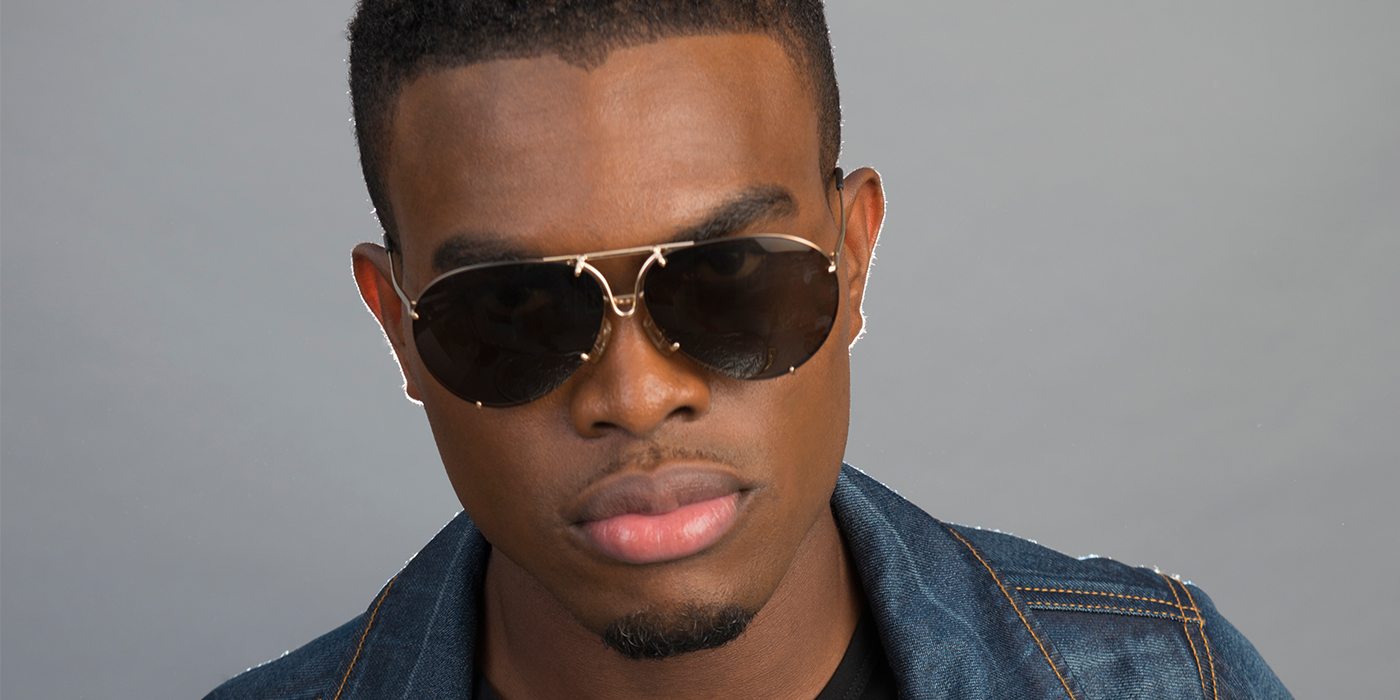 a close up on OMI's hot face with sunglasses on- he's gorgeous.jpg