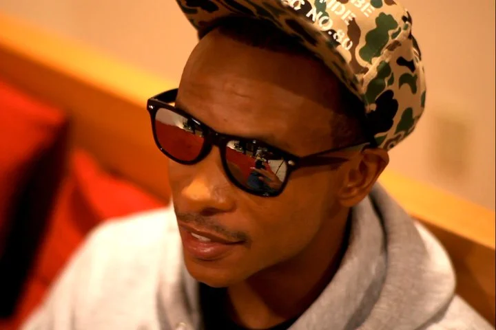 Tabi Bonney wearing a camouflage hat.jpg