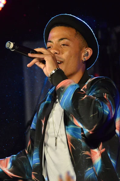 Nico Sereba looking hot with the microphone singing.jpg
