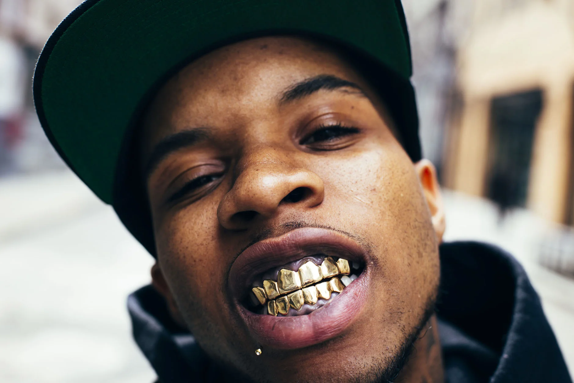 Tory Lanez looking gorgeous with a grille.jpg