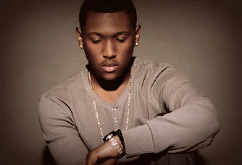 Hit-Boy looking down at his watch looking hot af.jpg