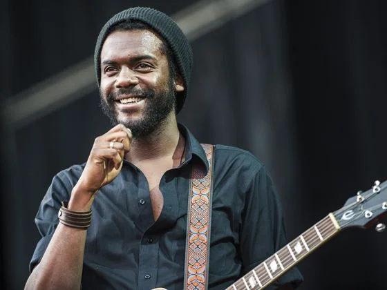 Gary Clark, Jr. looking gorgeous on stage with his hot smile.jpg