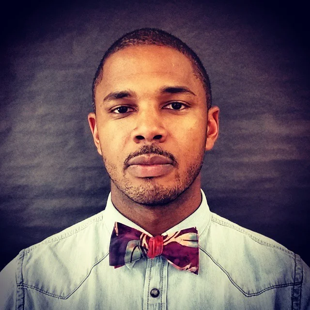 Substantial wearing a bow tie and looking hot af.jpg