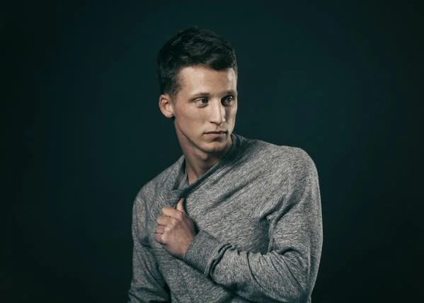 NF looking off to the side in a photo shoot.jpg
