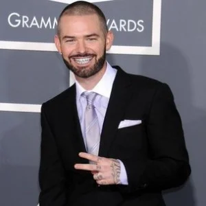 Paul Wall looking hot at the GRAMMY awards red carpet.jpg