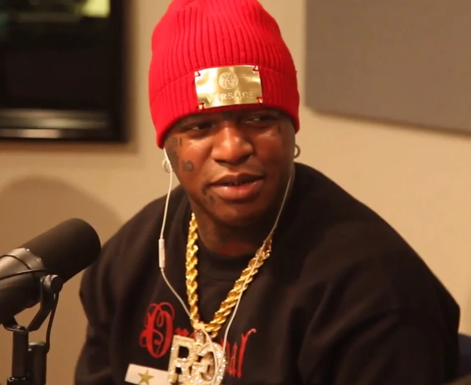 Birdman looking hot in a red hat.jpg