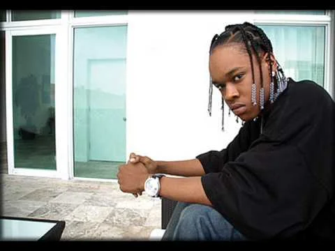 Hurricane Chris sitting in a room with sliding glass doors.jpg