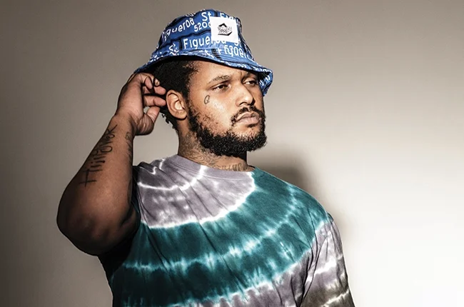 Schoolboy Q looking gorgeous in a grey and green tie dye shirt.jpg