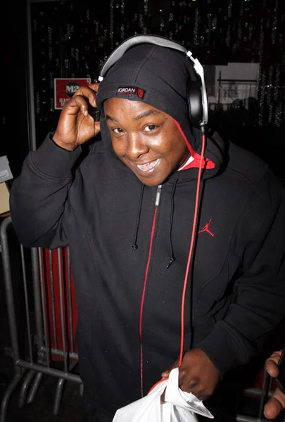 Jadakiss wearing black and read and looking hot smiling.jpg