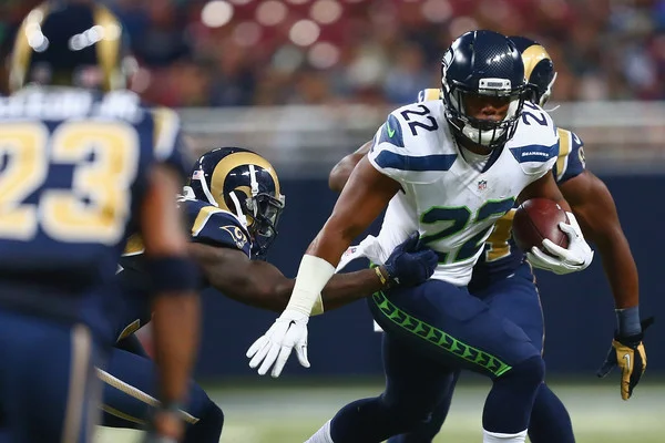 Fred Jackson running with the ball during a game against the Rams.jpg