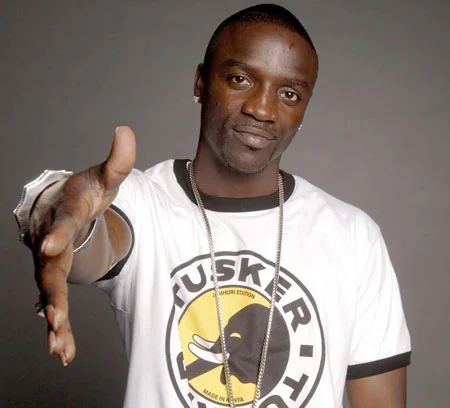 Akon holding his hand out for a handshake because he's a real gentleman.jpg