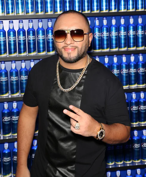 Alex Sensation looking hot in a black shirt and sunglasses.jpg