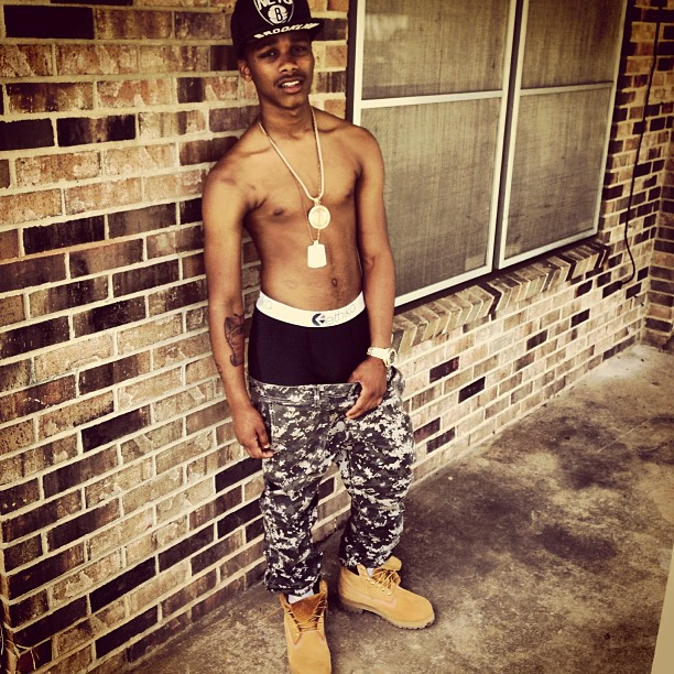 Li'l Snupe looking hot shirtless in camo pants and Timberland boots.jpg