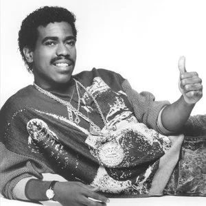 Kurtis Blow looking hot in a nice sweater as he gives thumbs up.jpg