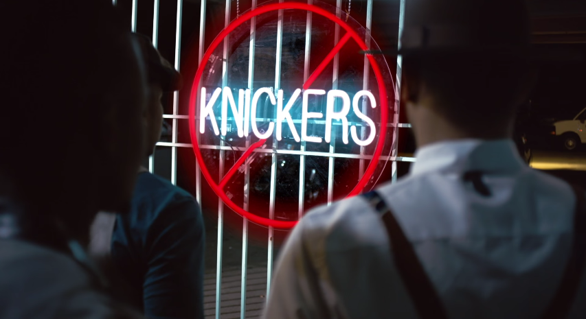 the no knickers sign on the gate in Jidenna's video for Knickers.jpg