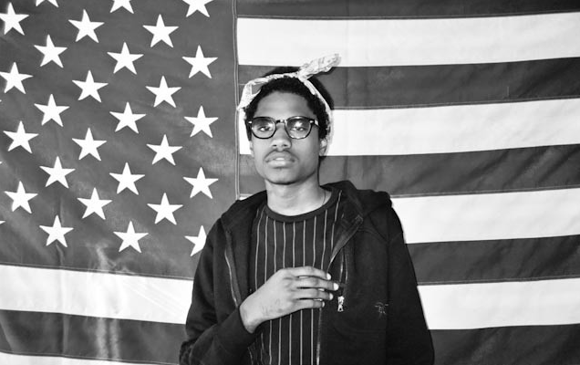 A$AP Dom behind an American Flag looking hot.jpg