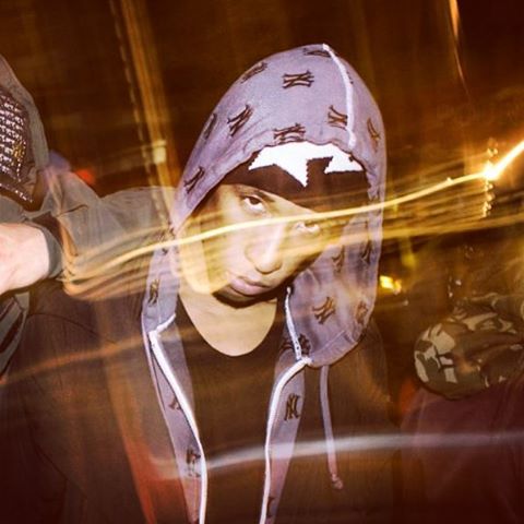 A$AP Josh looking hot in a hooded sweatshirt outside.jpg