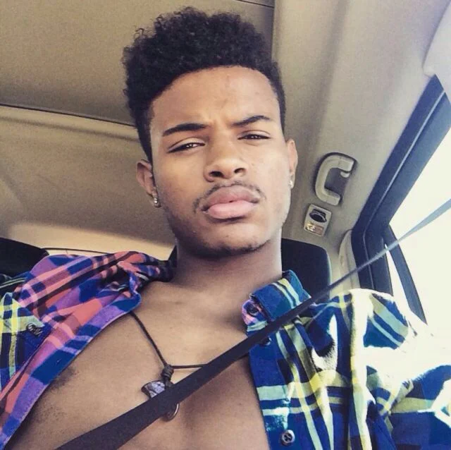 Trevor Jackson looking hot in the car with his shirt unbuttoned.jpg