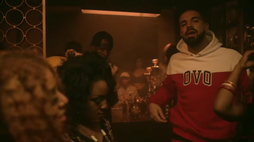 Drake in his OVO varsity sweatsuit in the Work video by Rihanna.jpg