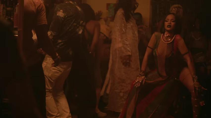 Rihanna looking like she's trying to squat and take a shit in the Work video.jpg