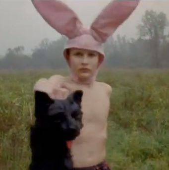 Jacob Sewell as Bunny Boy holding up a dead cat in Gummo (1997).