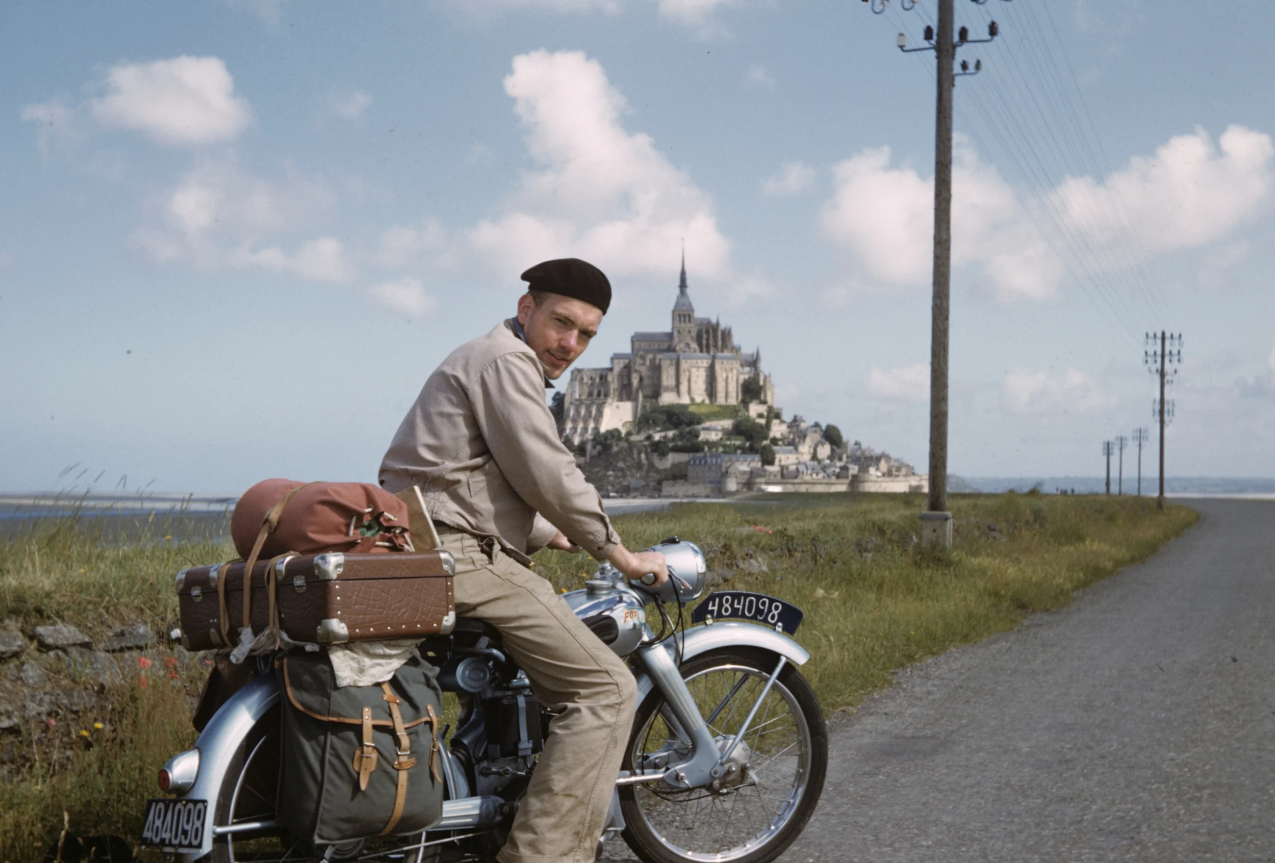 My dad took regular trips by motorcycle when he was a seminarian in Belgium. Here he is at Mont Saint-Michel, in Normandy, France, 1953. 