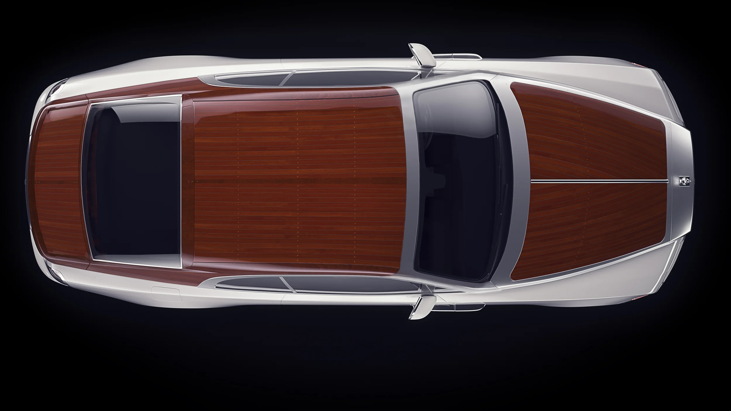 Like the deck of a ship, Regatta has concentrically curved and mortised  planks that mimic the beauty of the Rolls Royce body.