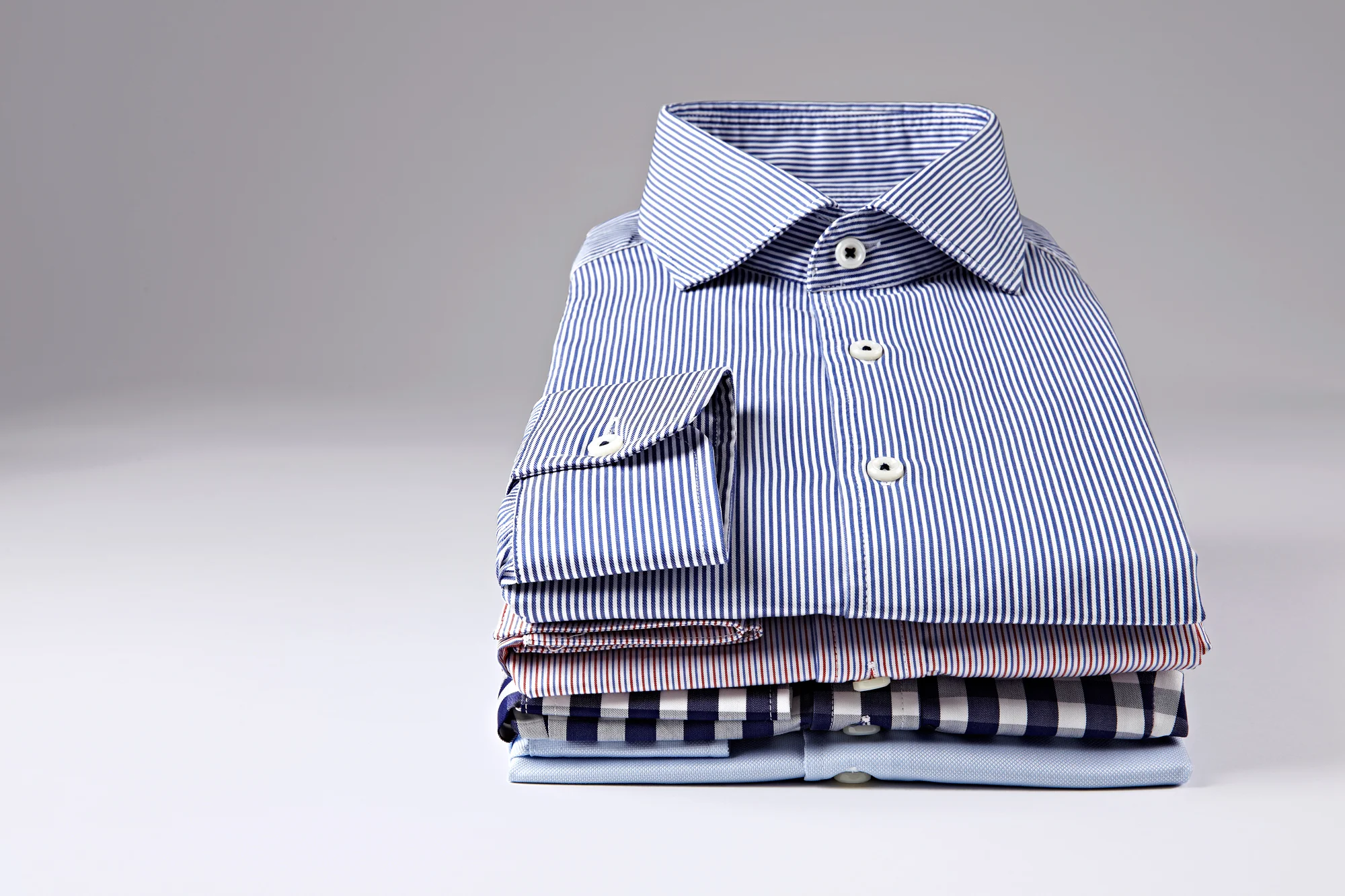 Tile 11_ABOUT SHIRT STACK.jpeg