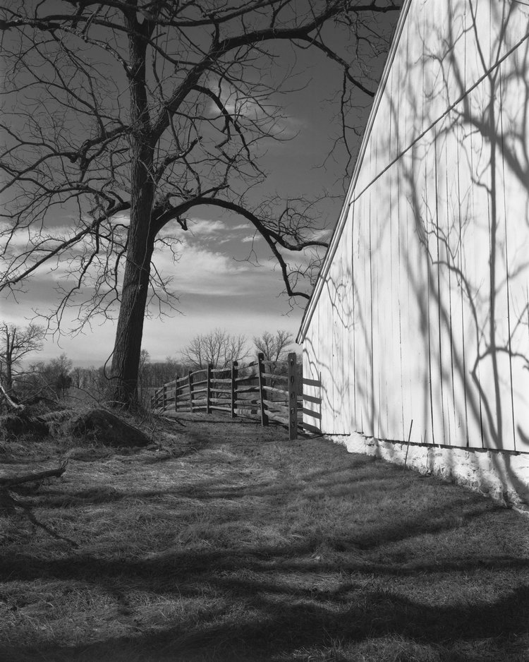  Shadows fall on the side of the barn on the John Slyder Farm at Gettysburg.&nbsp; 