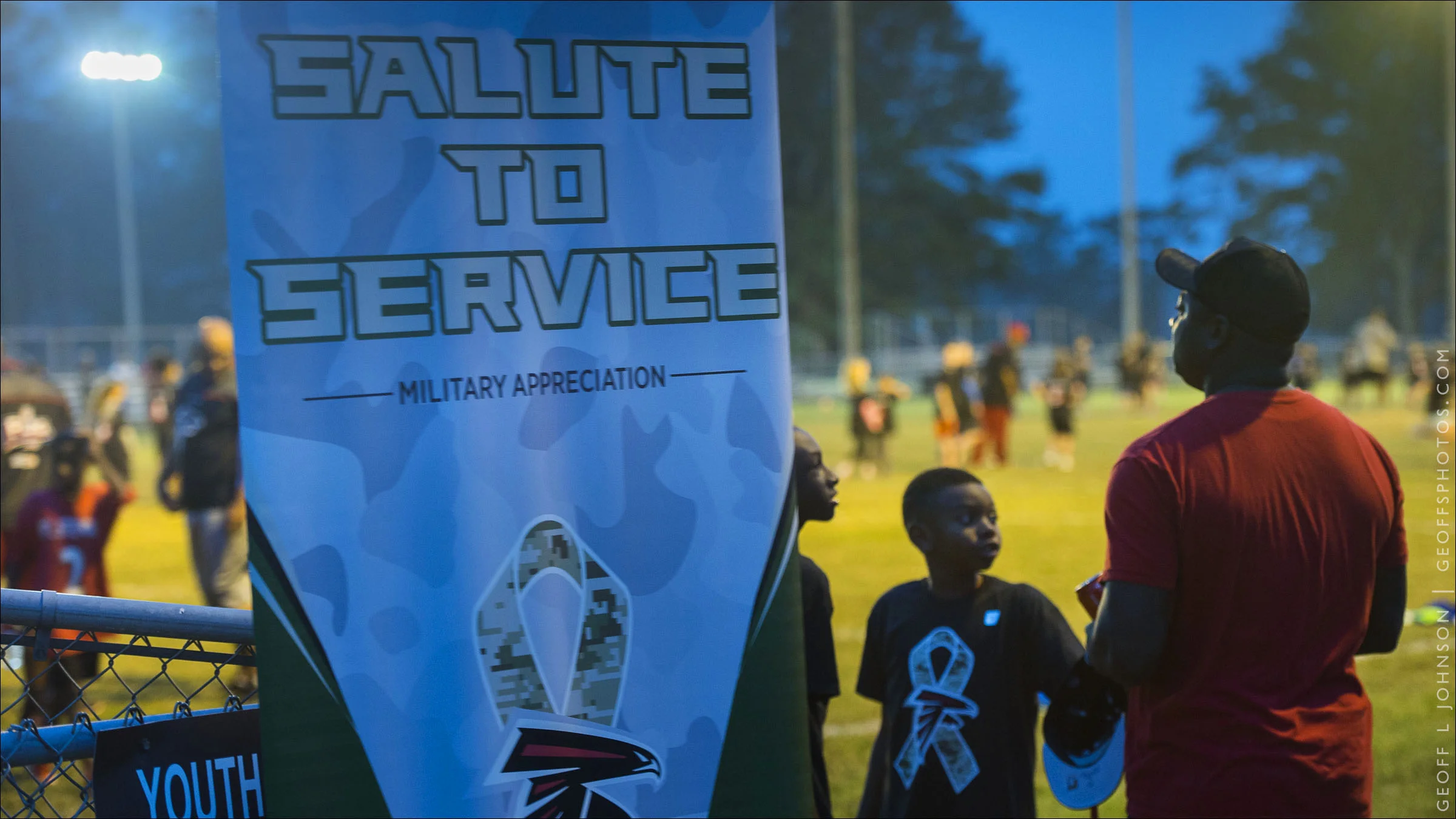 Kids & Pros Inc. Salute to Service Football Youth Clinic, with former Atlanta Falcons Buddy Curry and Bobby Butler.