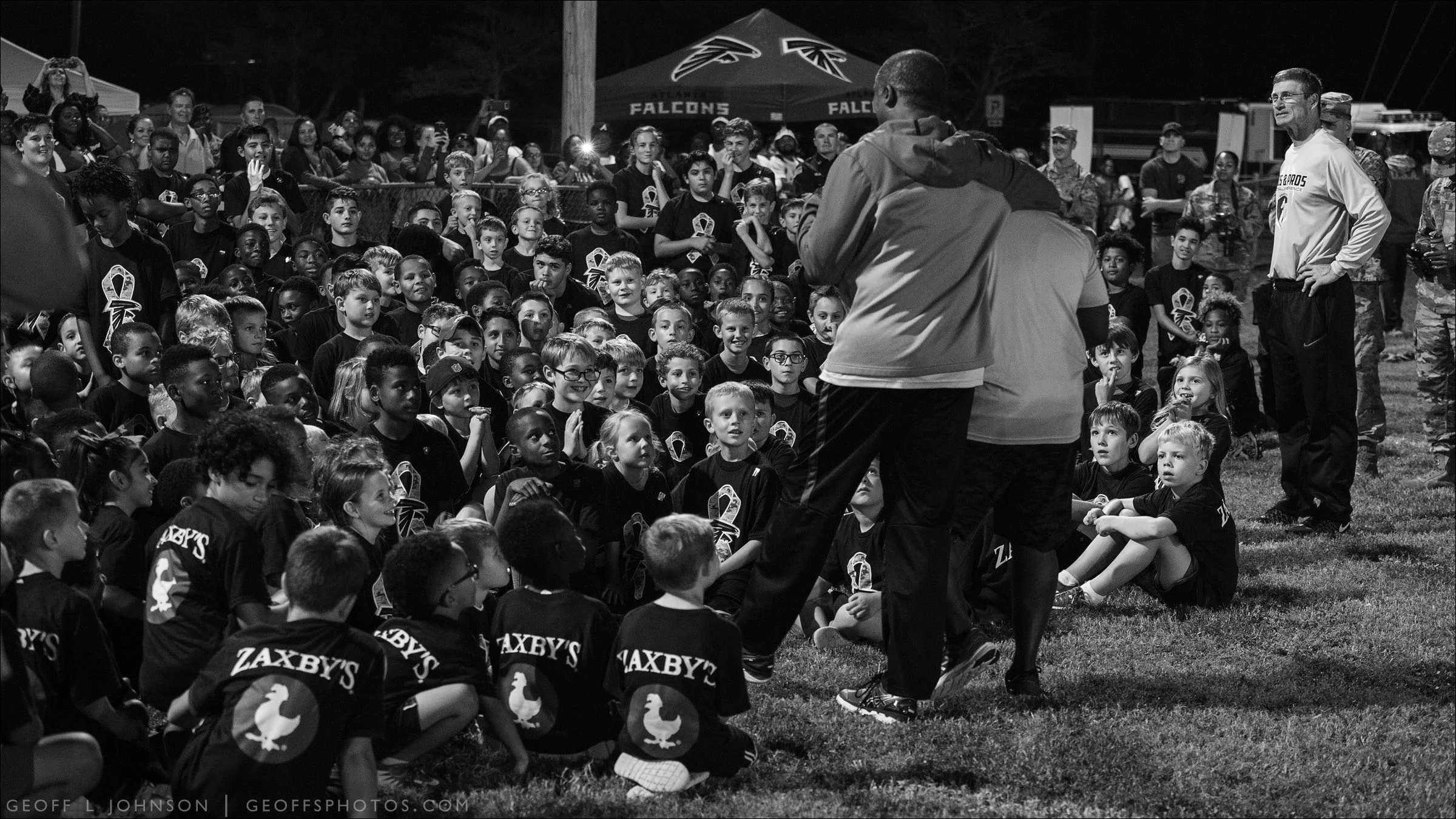 Kids & Pros Inc. Salute to Service Football Youth Clinic, with former Atlanta Falcons Buddy Curry and Bobby Butler.