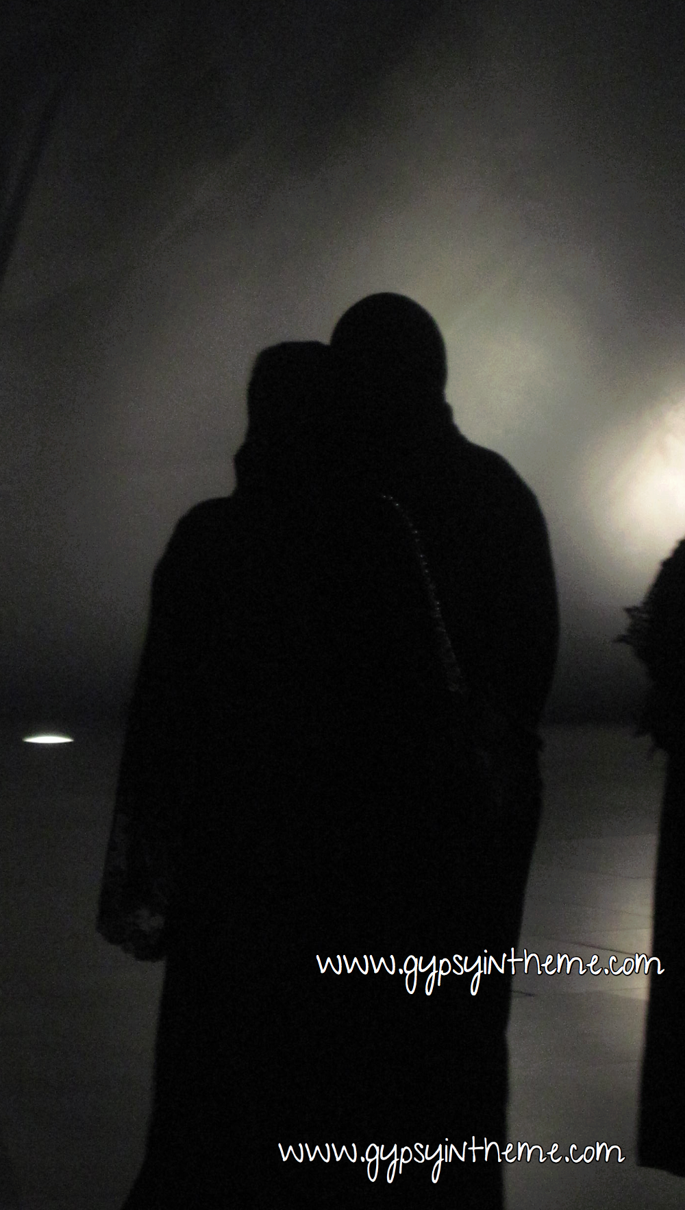 Abayas at night.