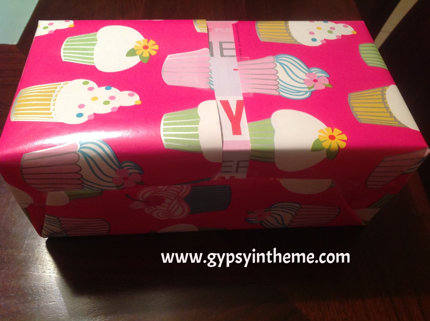 Yes, that is a Sketcher's shoe box peeking out where I ran out of paper. But in my mind, the box colours complement the wrapping paper quite nicely.