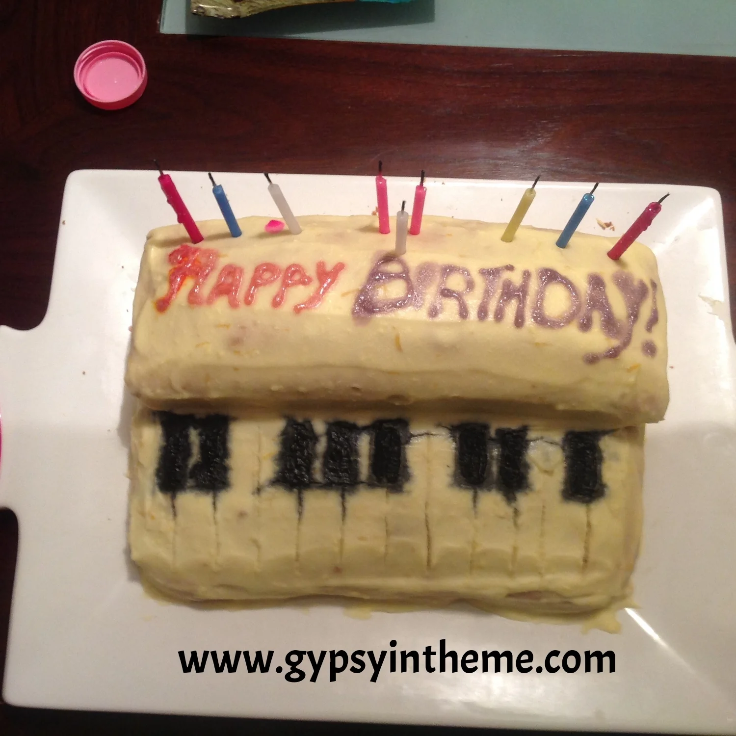 The cake was even worse for wear after a night in the fridge ... my black icing keys bled into the homemade cream cheese icing. 