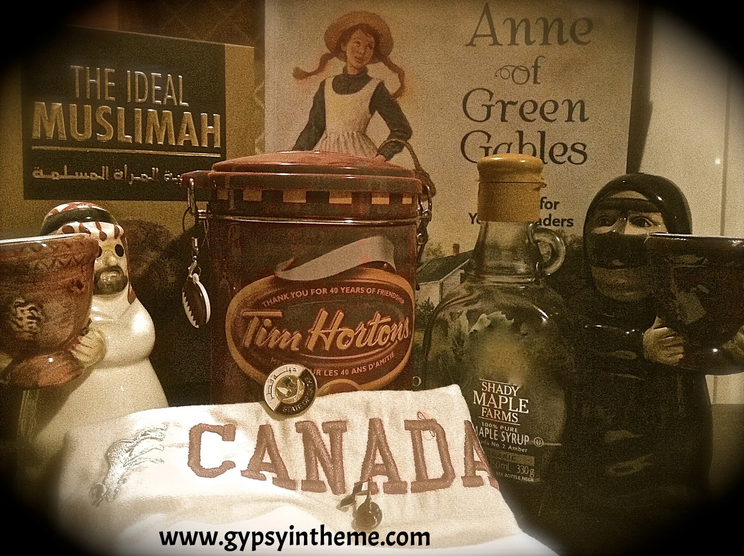 Trying to depict some of the many contrasts of being a Canadian woman working in the Middle East ... savoury and sweet, black and white, the iconic Canadian little rebel (Anne of Green Gables) and the Ideal Muslimah. 