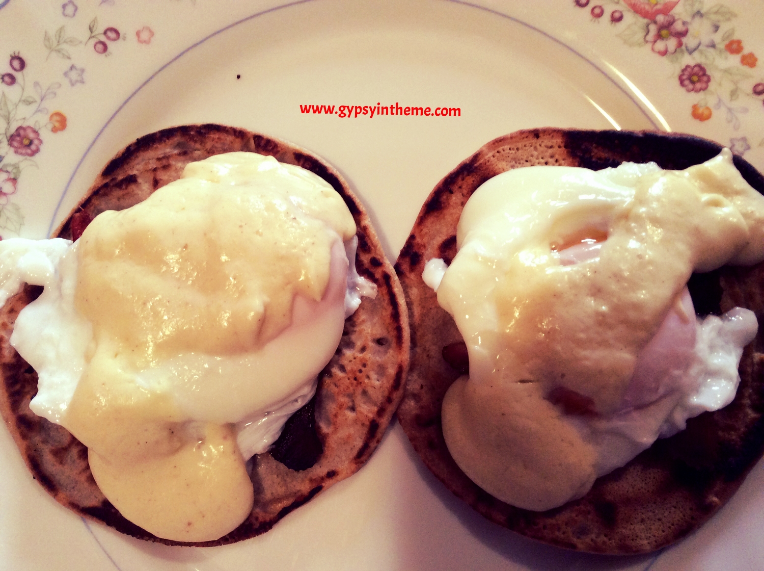 Eggs Benedict on blinis (buckwheat pancakes). Despite the name, buckwheat contains no wheat. It is a fruit seed that is ground into a floury powder. Buckwheat pancakes were my favorite as a child, so you can imagine my joy when I found out that it is wheat-free. The black bits you see poking out are pieces of bacon, but you can easily replace the bacon with ham, salmon, asparagus or anything else that pleases your fancy. The pseudo Hollandaise sauce is Hellmann's low fat mayonnaise, lime juice, a knob of butter, dijon mustard and a dab of Crystal hot sauce. To poach the eggs, I bring water to a slow boil, add a tablespoon of vinegar, break an egg into a small bowl, then pour slowly into the water. I remove the egg after 2 minutes using a slotted spoon.