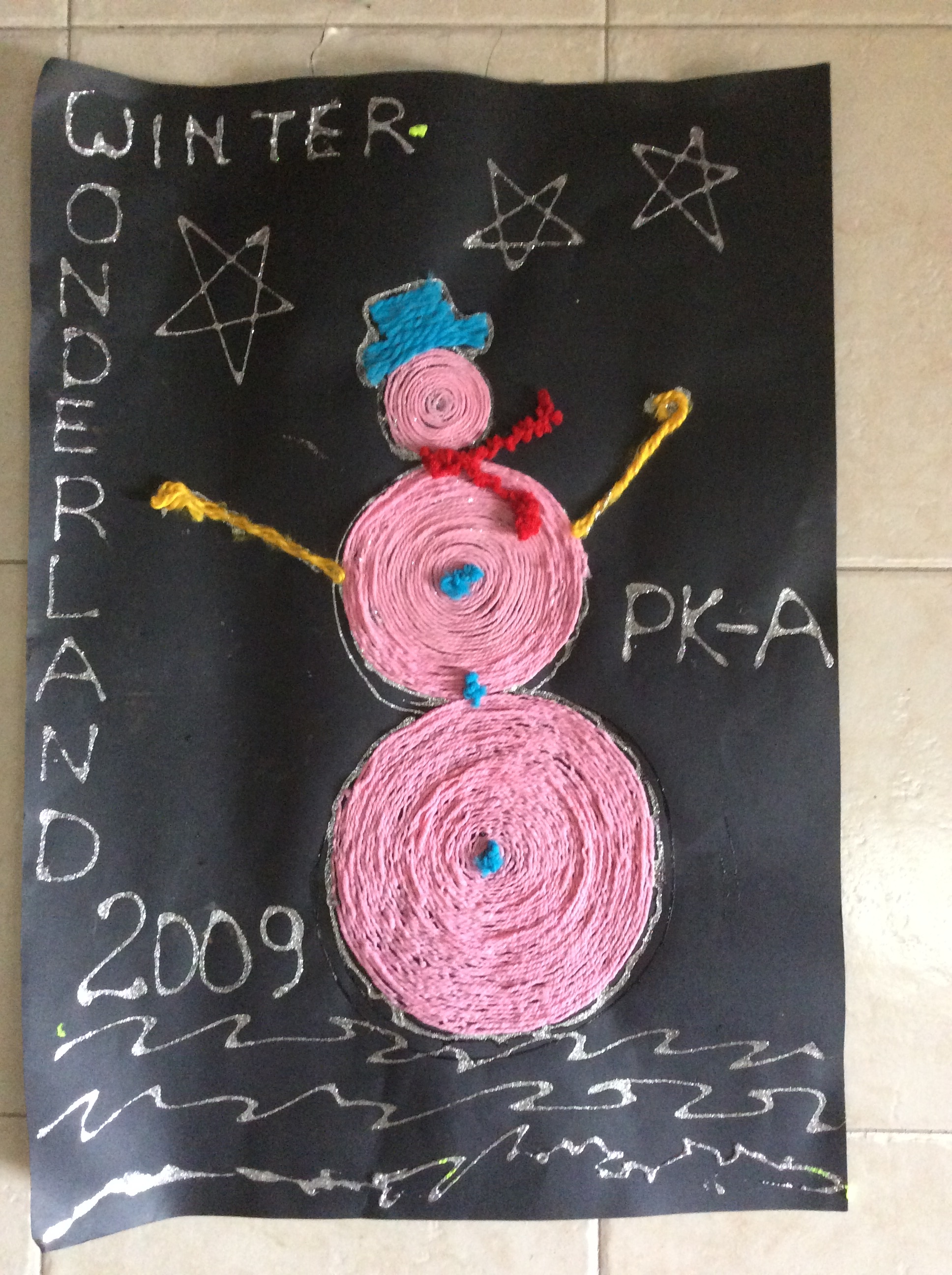 Kiddo's pre-kindergarten homeroom Christmas door decoration. Looking at this now, I'm thinking I probably played a bigger role in design and production than I'd care to admit.