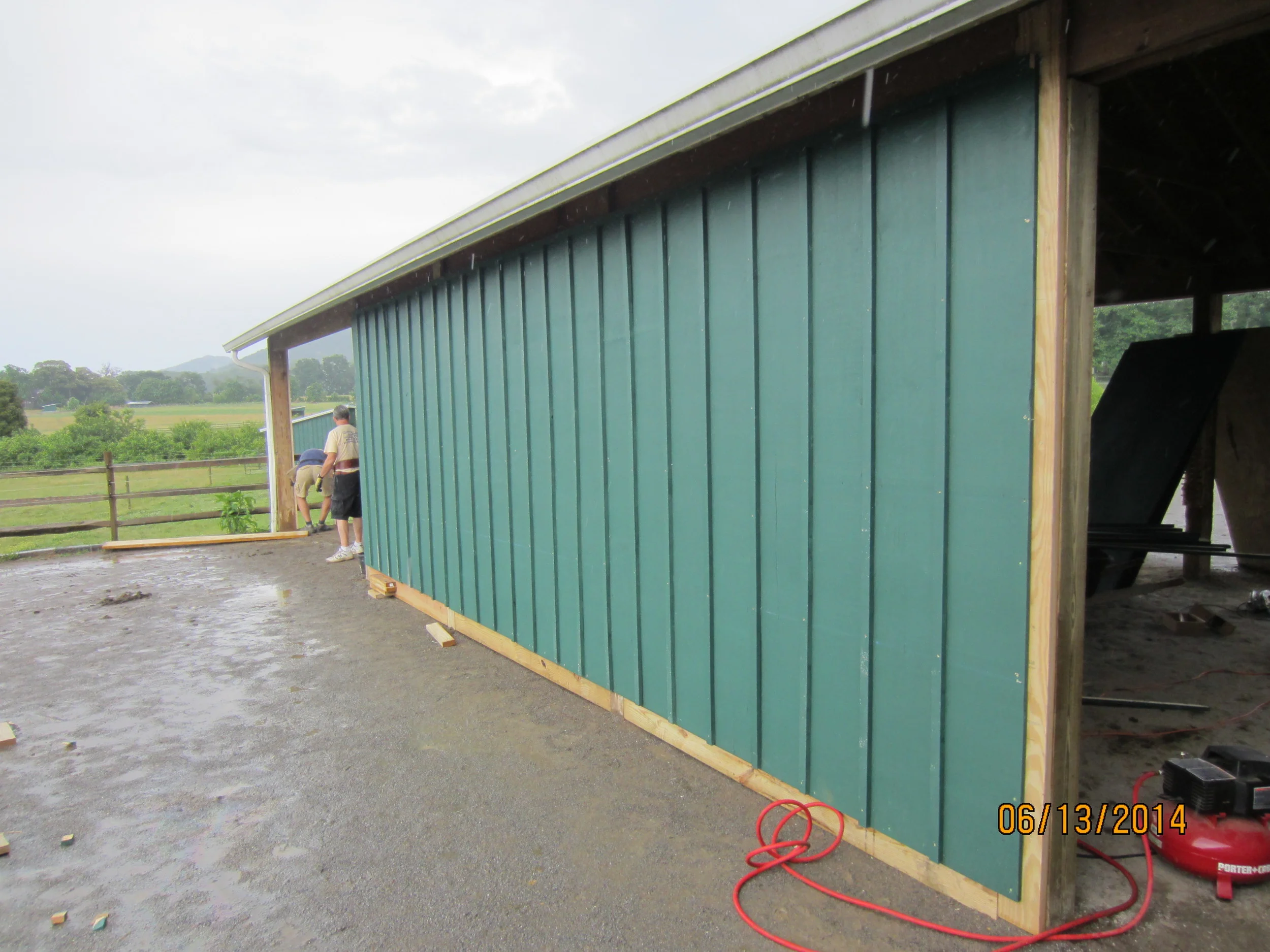 The Stables curtain wall is complete on one side. Kerry Higgins is in the background.