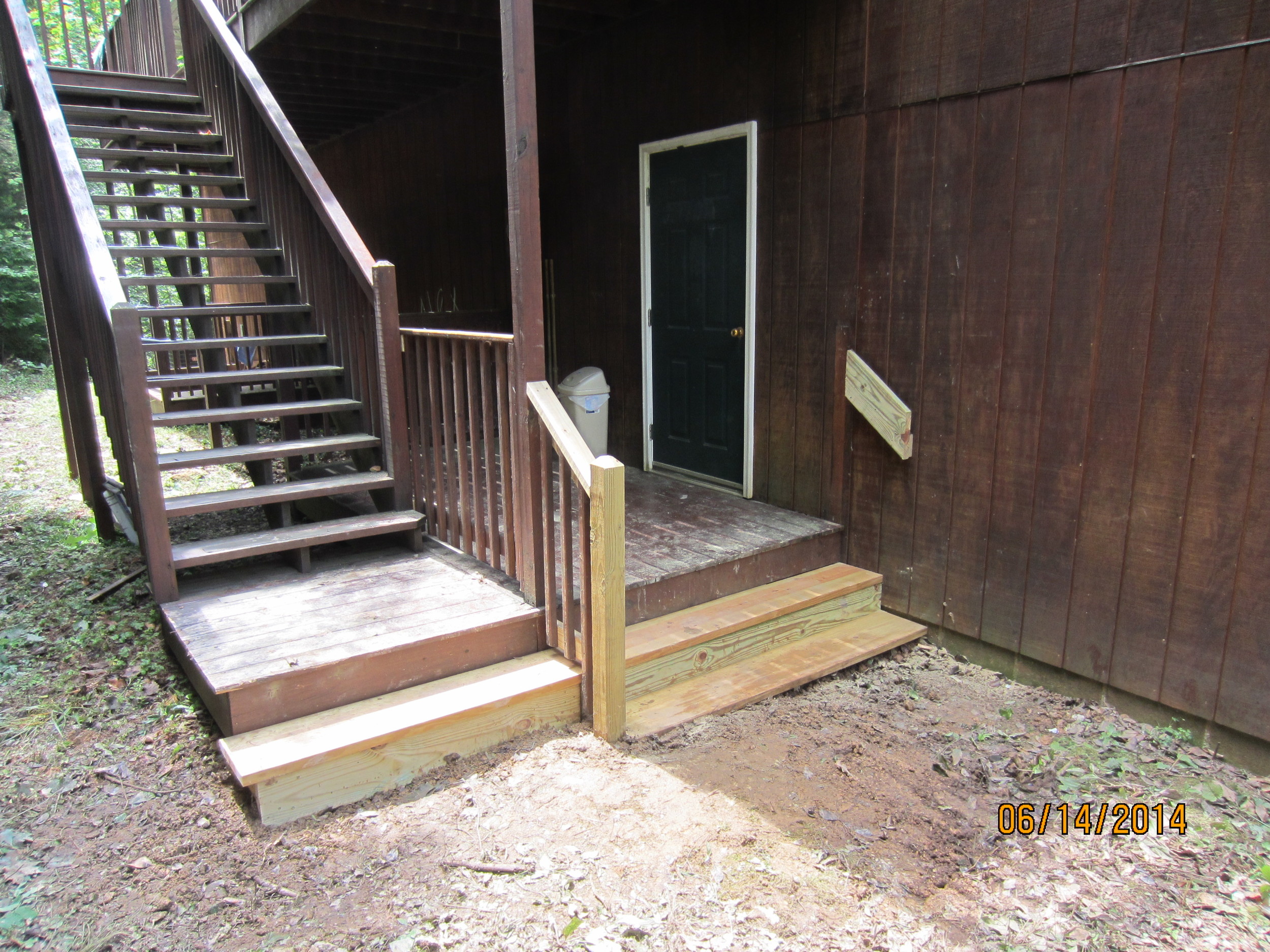 The new steps constructed on front of the Dormitory are complete, awaiting staining.