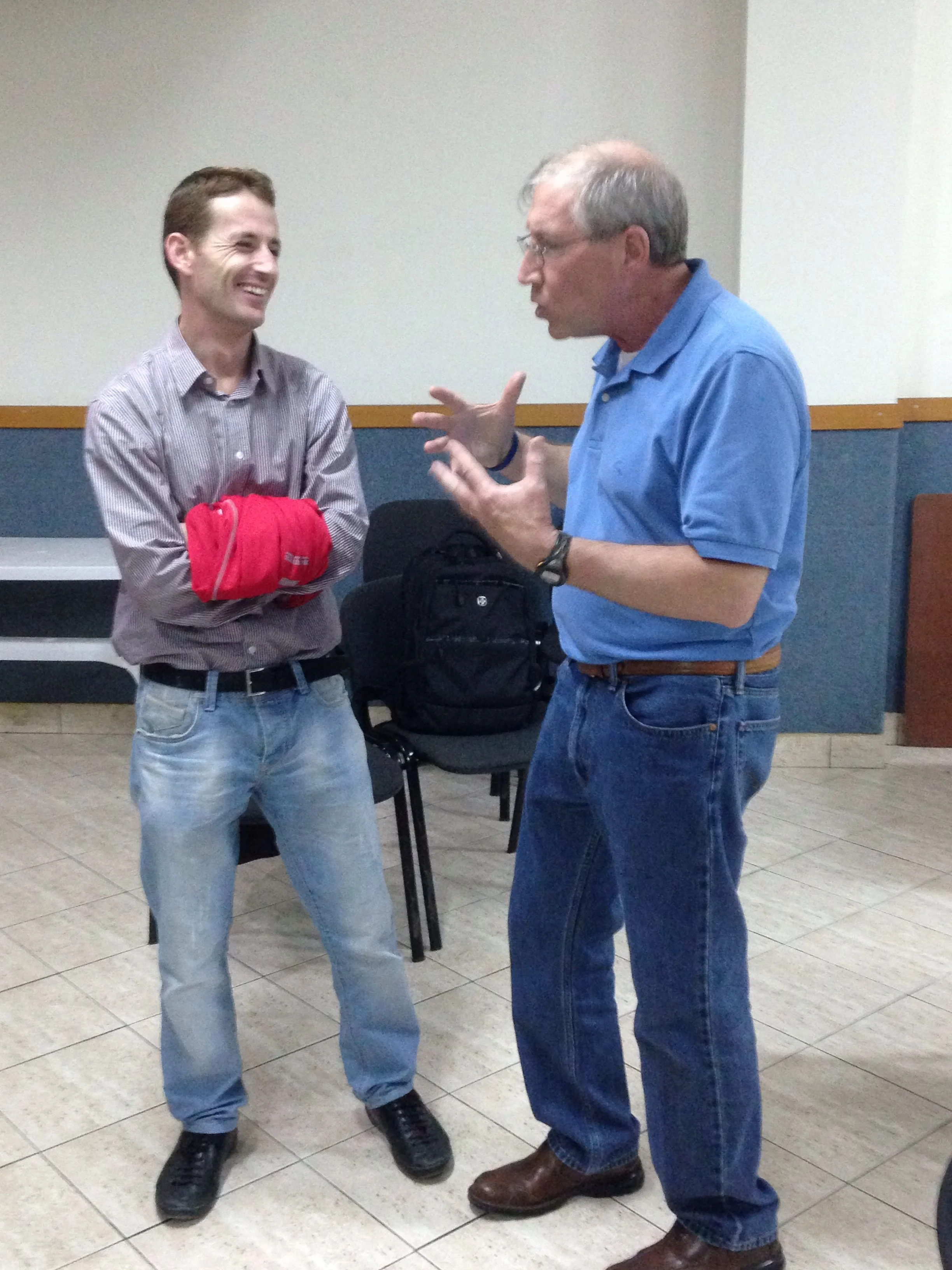 Gusti, the leader of Jete Studentore Tirana, talking to Jim