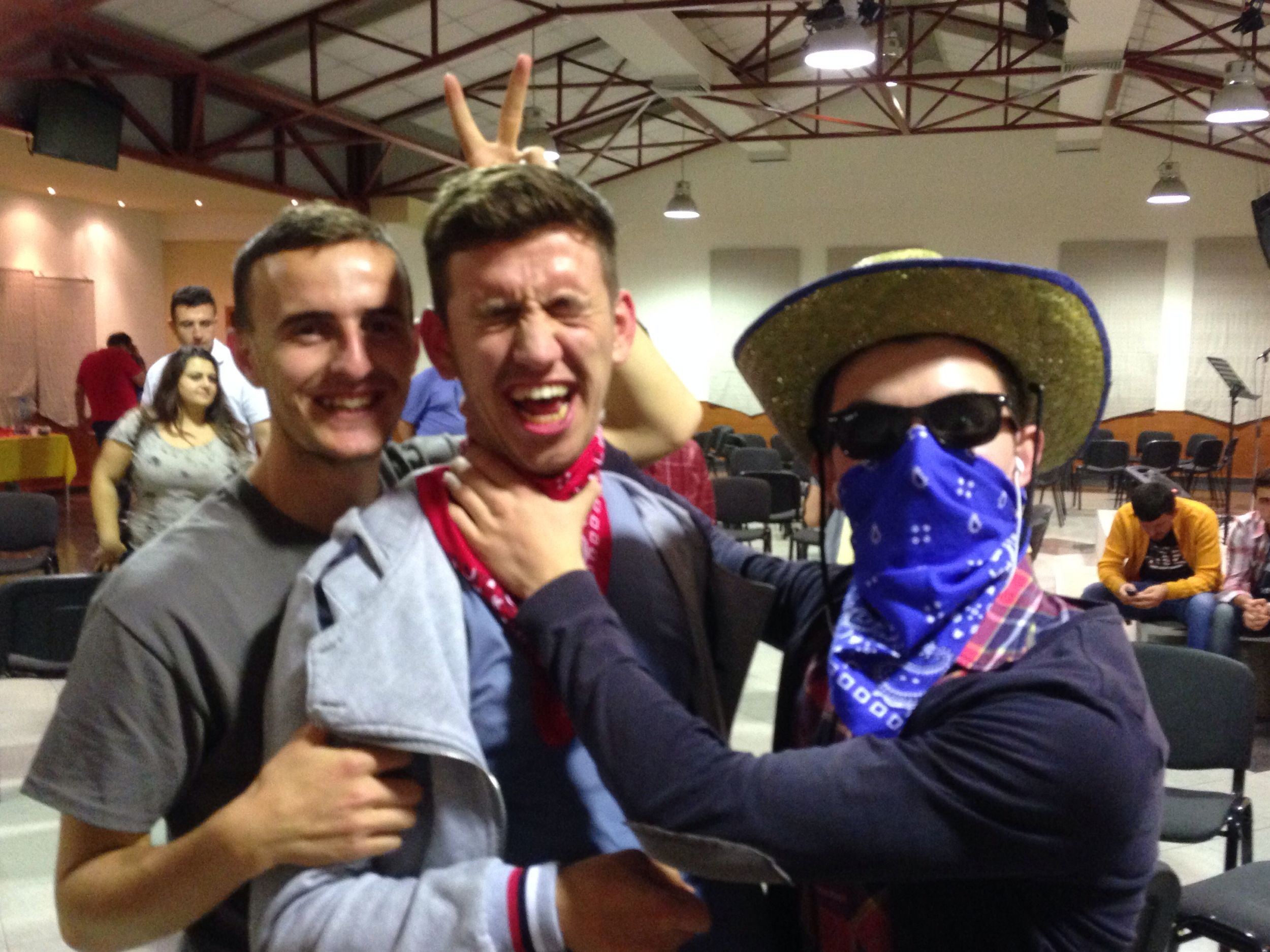 Guys Having Fun at the Photo Booth