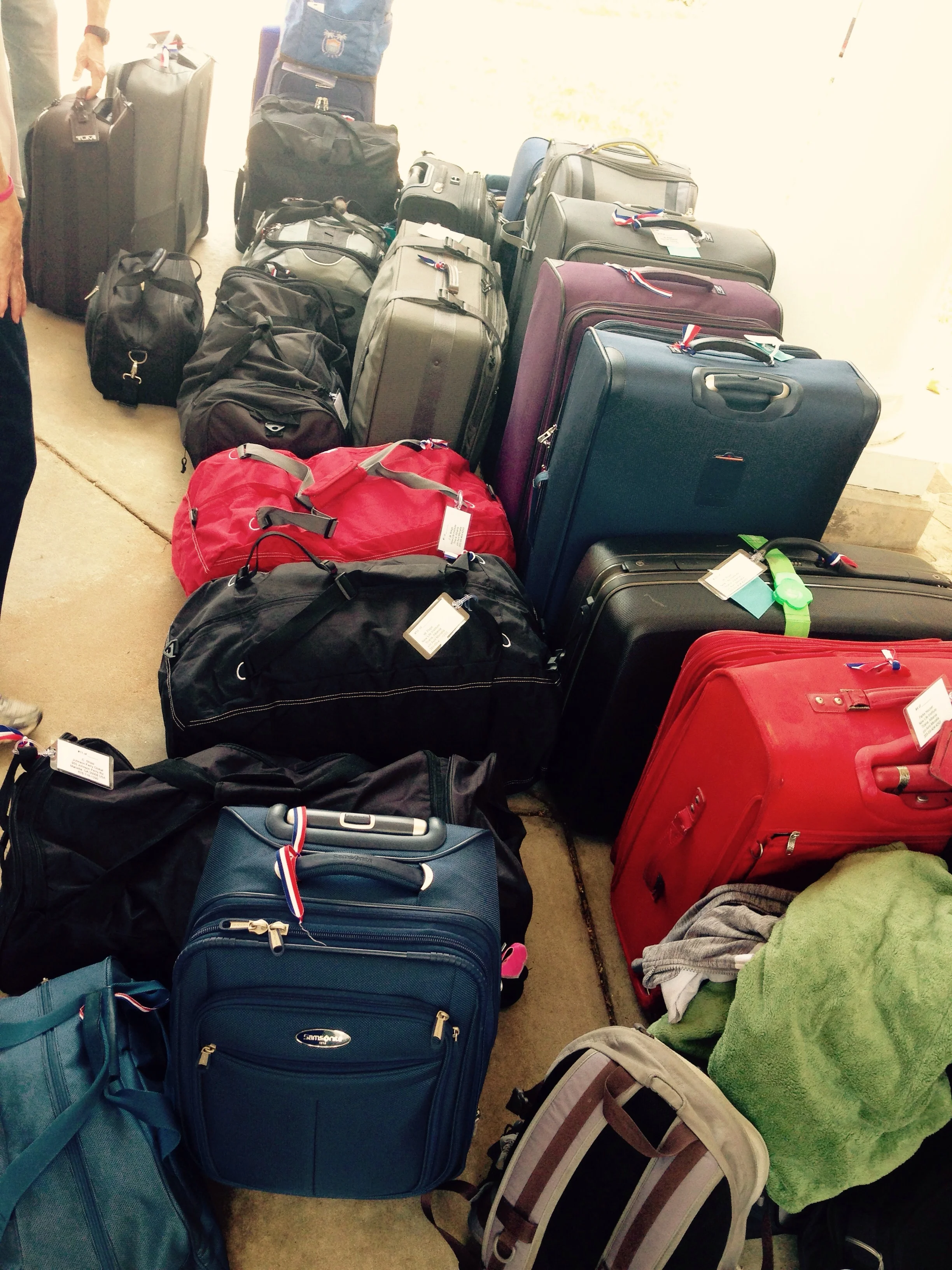 21 checked bags, 12 personal carry-ons, and at least 5 regular carry-ons