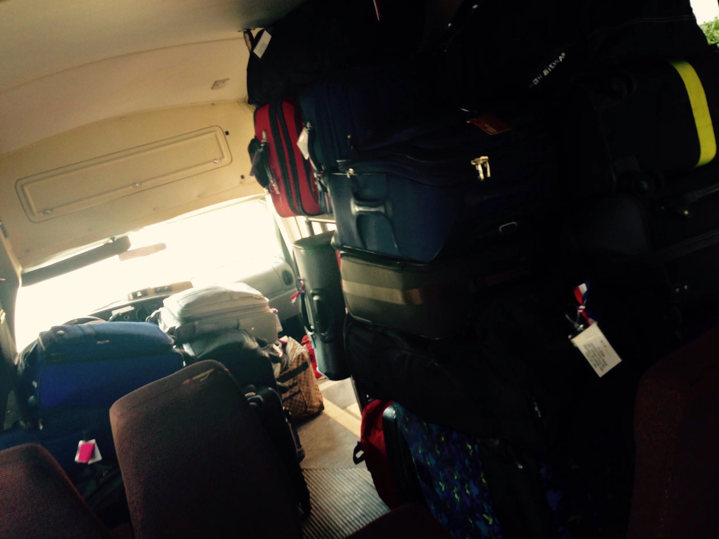 We made sure Jonathan sat next to the loose luggage. We figured he'd fare better if anything fell. 
