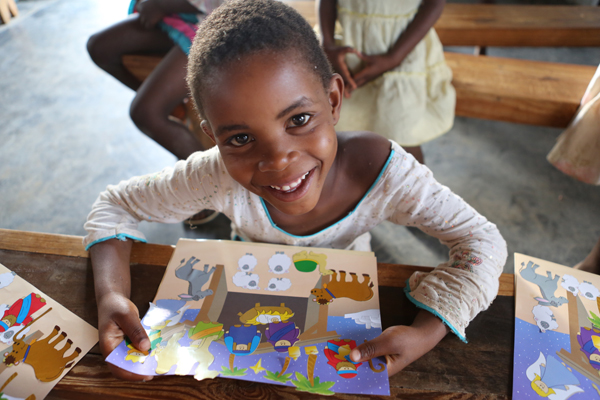 Later today, Lisa told the Christmas story while the children put together sticker pages to go along with it. 
