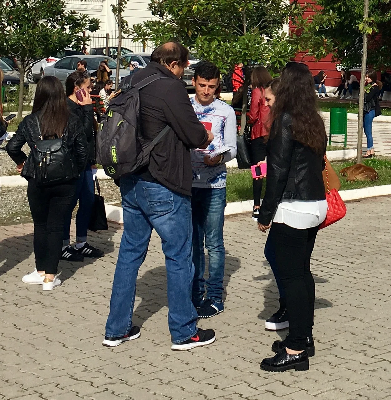Giving students invitations to American Night