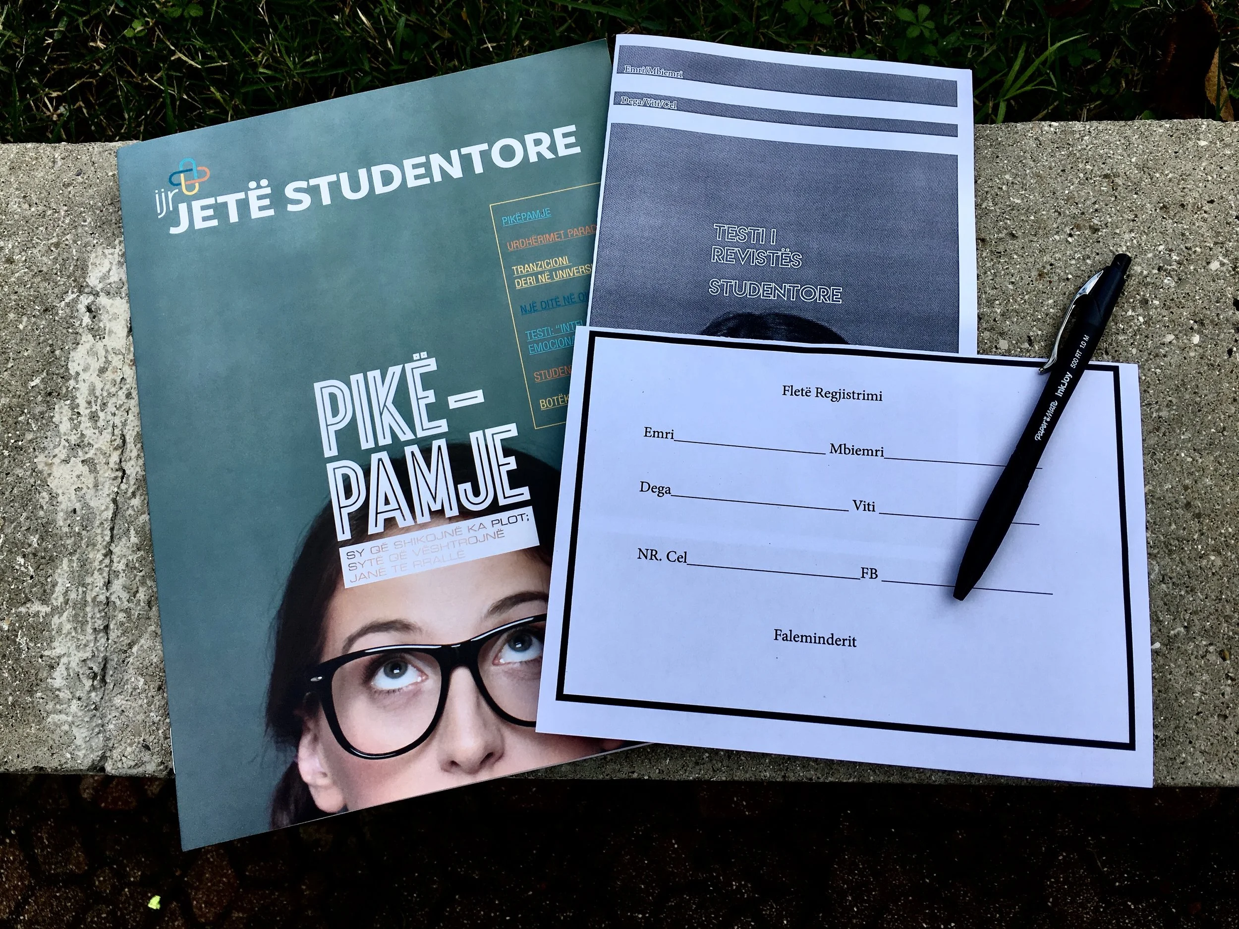 The student magazine, the test they can take to possibly win an iPad mini, and the sheet each student would complete with their contact information