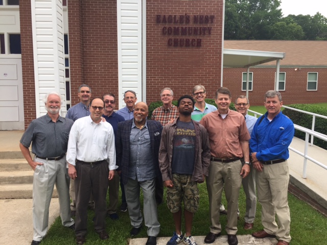 The mission team with Pastor Larry and a new neighbor