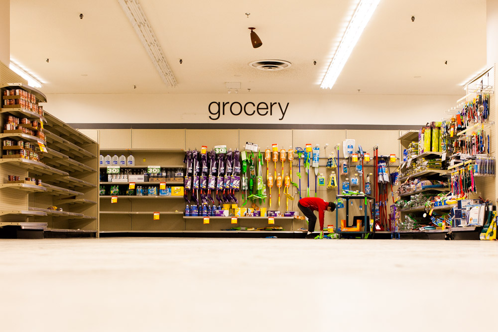 Employees struggle to keep the shelves looking stocked.